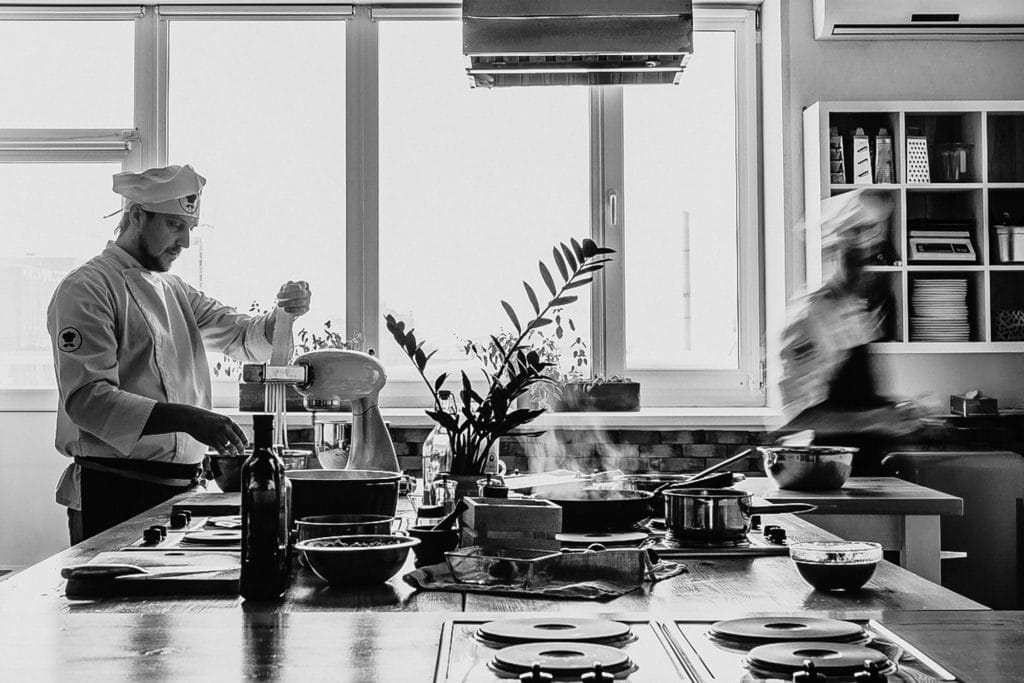 Chef Making Pasta On Kitchen