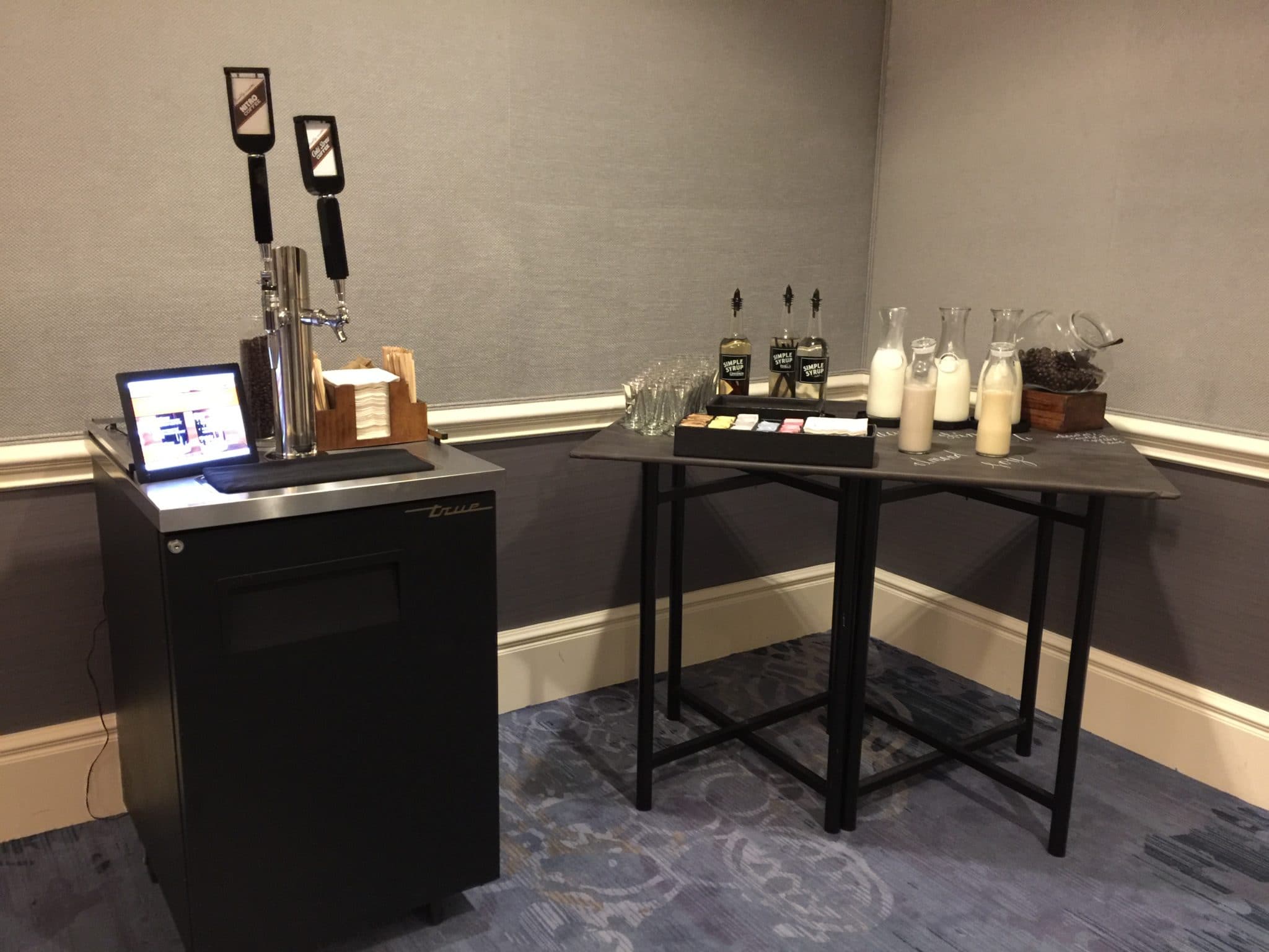 Keg - beverage dispenser and coffee ingredients on table