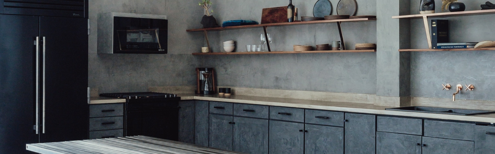 upscale kitchen with matte black refrigrator