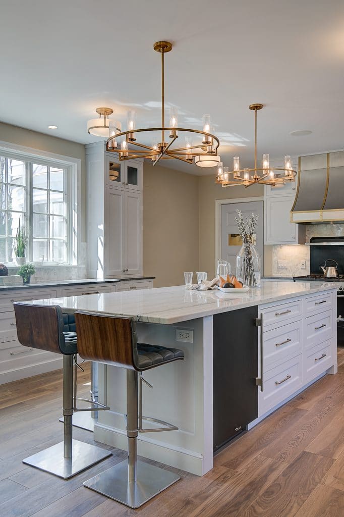 A Kitchen as Timeless as a Chanel Suit - Elegant Kitchen Display with marble countertops - Cropped Image