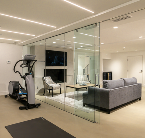 Antique White and Brass True Residential units - two freezers and one glass door refrigerator and Workout Machine