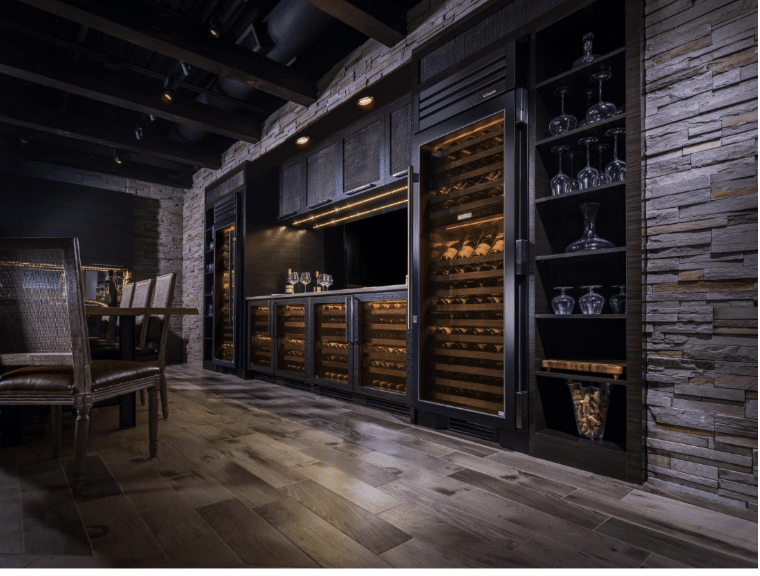 Dark Tones with Staggered Stone Brick Wall - Black Glass Door Refrigerators and Bar Shelving